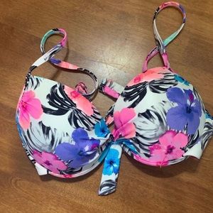 Pink and white bathing suit top. Size medium